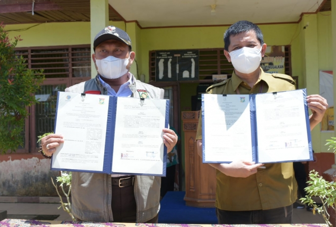 Kunker Ke Balung, Bupati Kampar Serahkan Sertipikat Tanah Dan Tandatangani MoU Dengan BPN