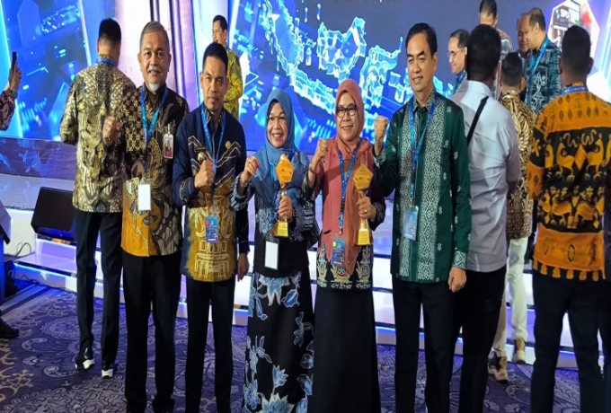 Pemkab Kampar Raih Penghargaan TP2DD Kabupaten Terbaik Se - Sumatera Tahun 2024