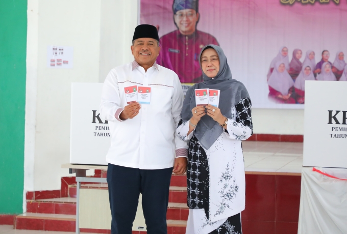 Usai Gunakan Hak Pilih, Bupati Alfedri Harap Partisipasi Pemilih Meningkat