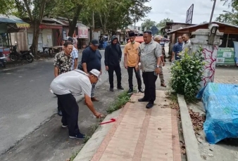 Camat Kisaran Timur Berikan Tanda Pada Relokasi Sementara Pedagang, Proses Penataan Mulai Dimatangkan
